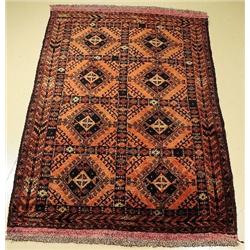 An Old Baluch Wool Rug.