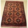 Image 1 : An Old Baluch Wool Rug.