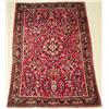 Image 1 : An Antique Persian Sarouk Wool Rug.