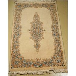 An Antique Persian Kirman Wool Rug,