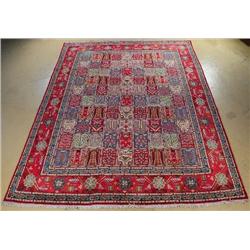 A Persian Kurk Kashan Wool Rug with Garden Motif.