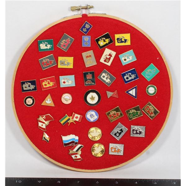 LOT OF CANADIAN THEME LAPEL PINS  ON FELT PIECE