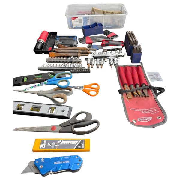 Table of assorted Allen wrenches, steel stamping punches, misc tools