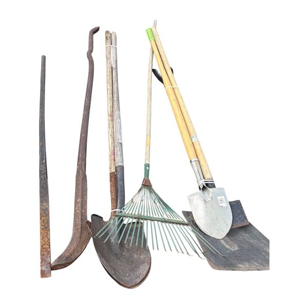 Pallet of shovels, rake, pry bar