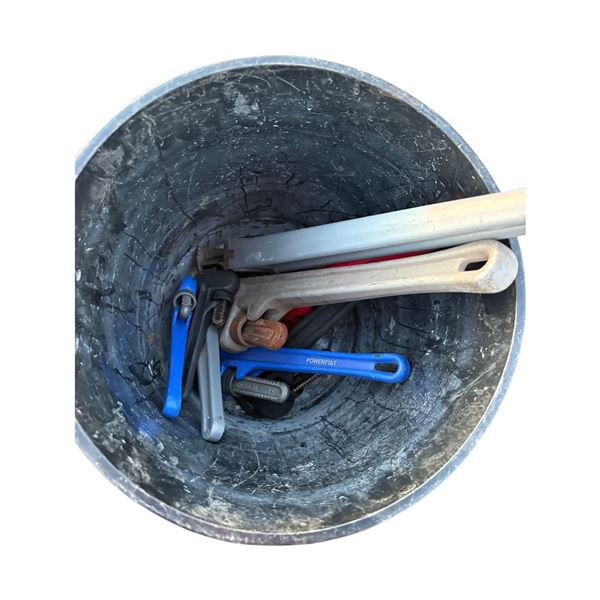 Pail of pipe wrenches