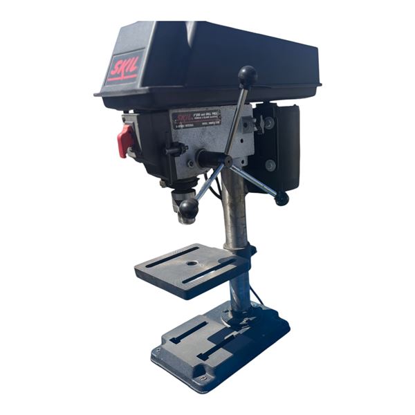 Skil drill press on wood table