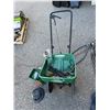Image 1 : Seeder  and sprinkler, etc.
