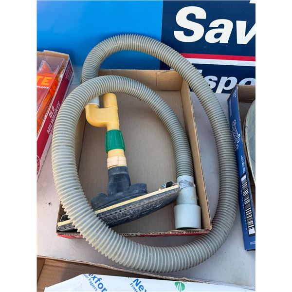 Sanding item with vacuum hose