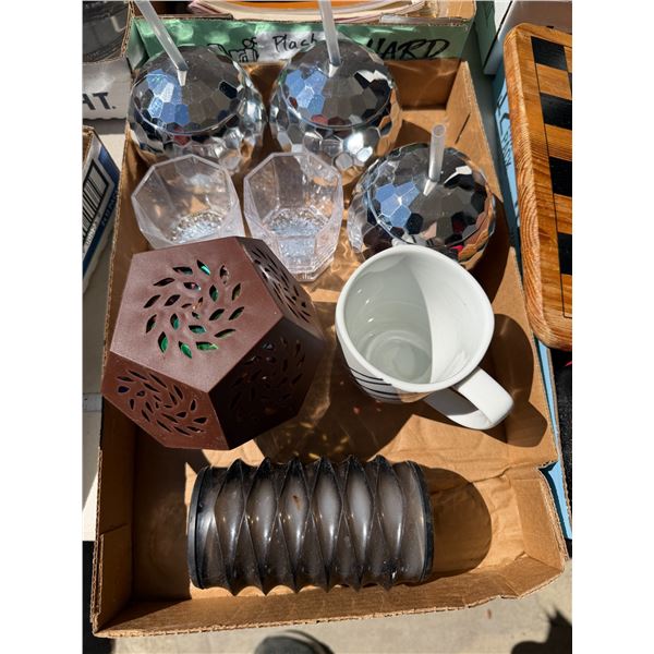 Assorted mugs and speaker and candle hold