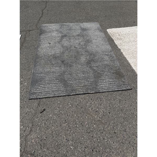 Area carpet 63" x 91"