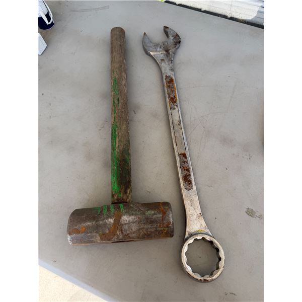 Large wrench and sledgehammer