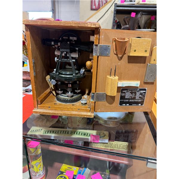 Handy 2 inch surveyors transit in wood box and wood leg tripod stand
