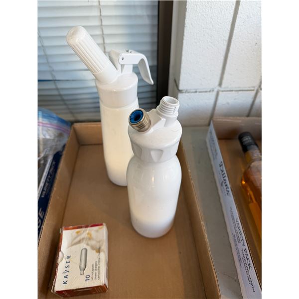 Whipped cream dispensers