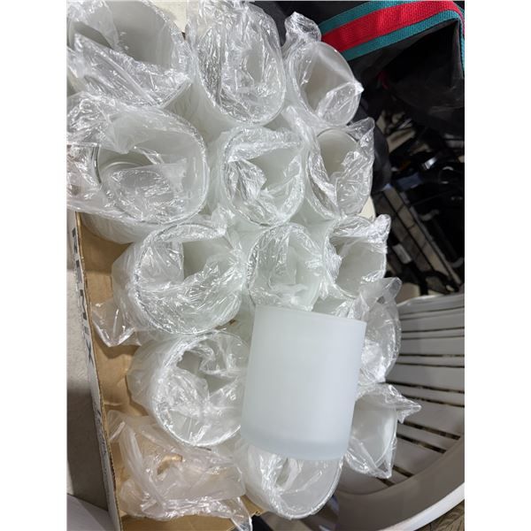 Smaller frosted candle holders or other jars