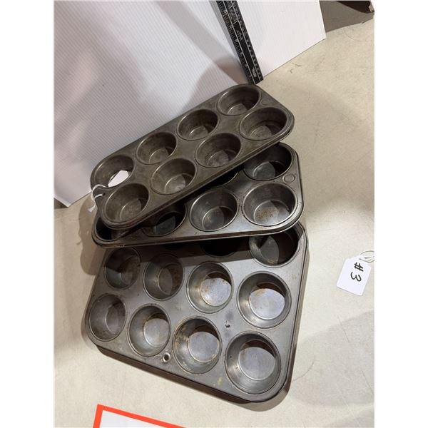 Three vintage muffin pans
