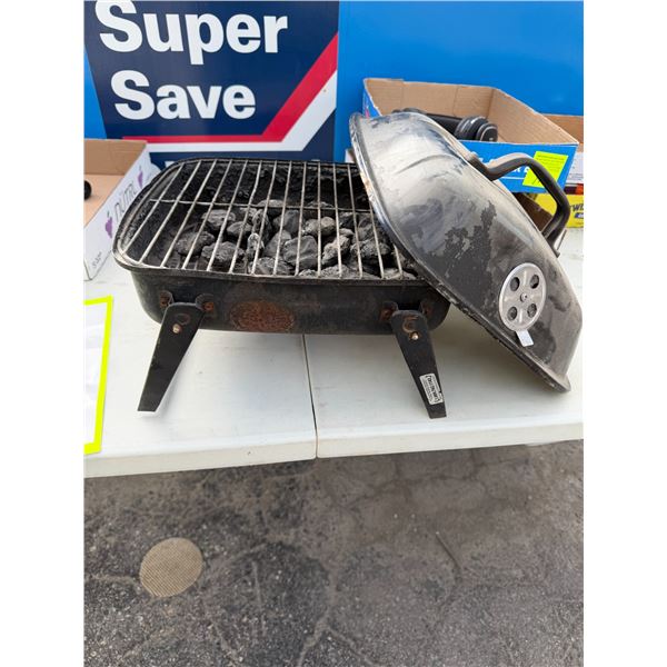 Portable charcoal barbecue