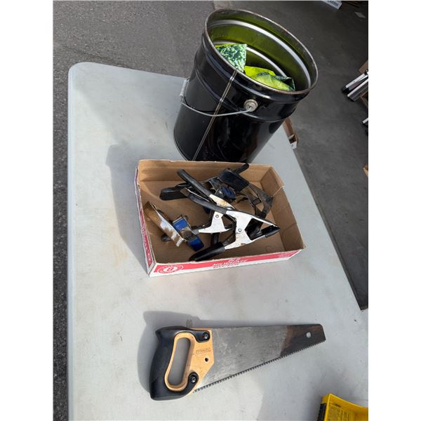 Clamps, pail and saw