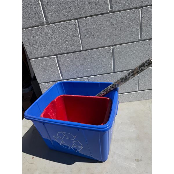Recycling bin, mop, bucket, and wrapping paper