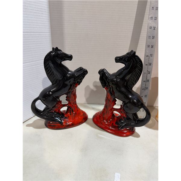 vintage Evangeline Pottery rearing horse figurines featuring a distinct flow red and black drip glaz