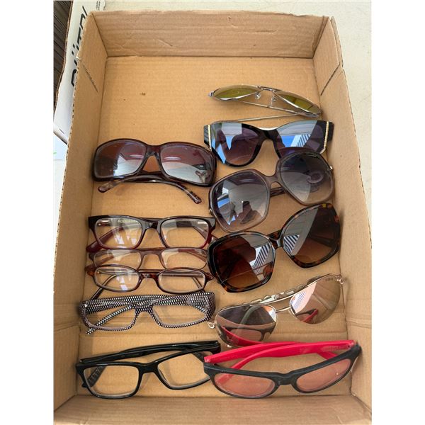 Assorted reading glasses and sunglasses