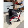 Image 2 : Evolution Xpresso Wide walker. One wheel has a flat spot.