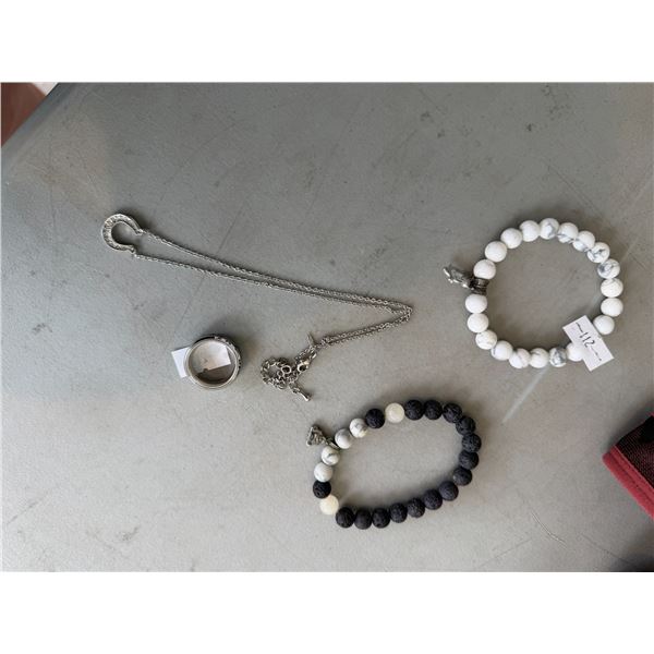 Bracelets, spinner ring, and necklace