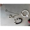Image 1 : Bracelets, spinner ring, and necklace