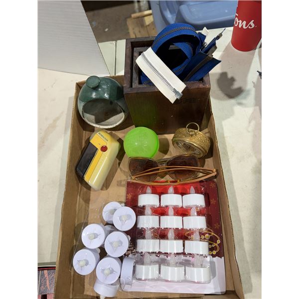 Miscellaneous lot clock, sunglasses, tea, lights, etc.
