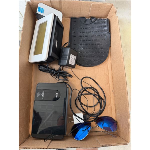 Clock, radios, kitchen, tap mat and sunglasses