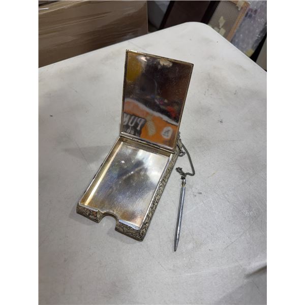 Mirrored notepad holder