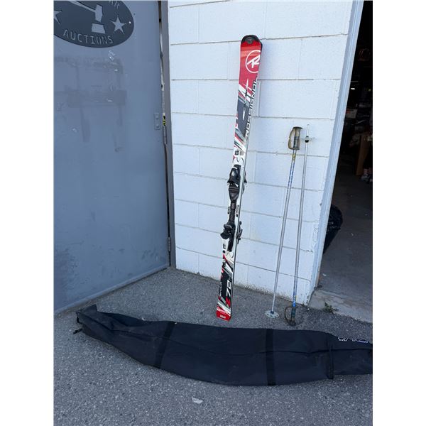 Rossignol skis comes with poles and ski bag