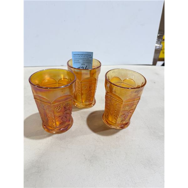 Fenton "Butterfly and Berry" pattern carnival glass tumbler in a marigold finish
