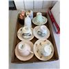Image 1 : Tea cups and saucers and floral decor