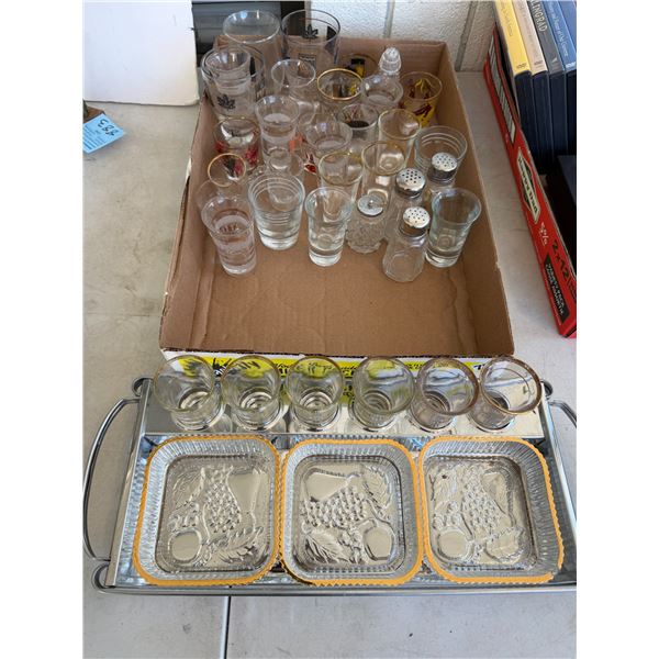 Assorted shooter glasses and salt and pepper shakers