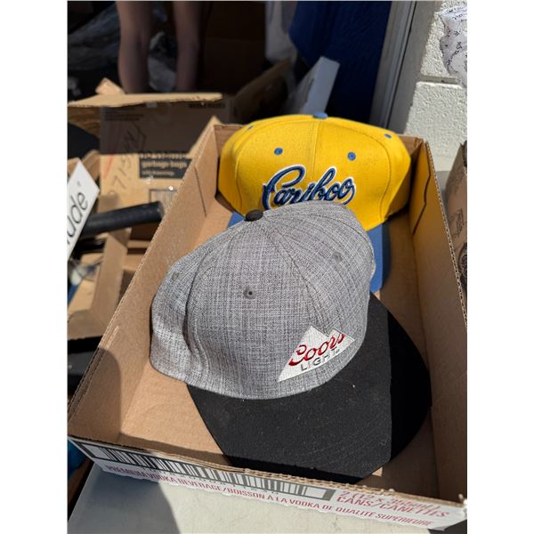 Caribou and Coors light caps
