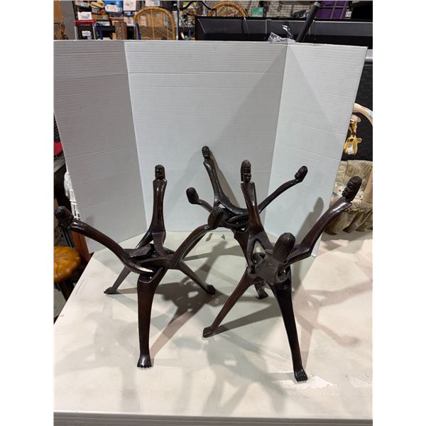 3 carved stands