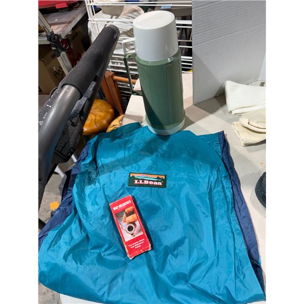 L. L. BEAN bag and map measure and thermos.