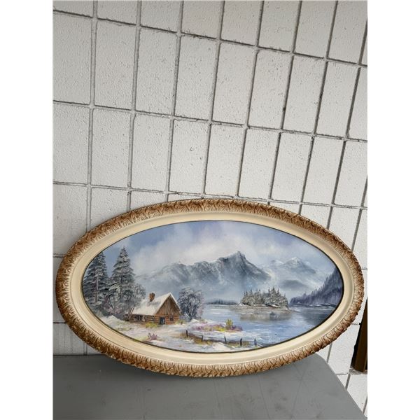 Oval framed artwork