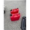 Image 1 : Fuel containers with contents