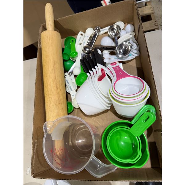 Measuring cups spoons and rolling pin