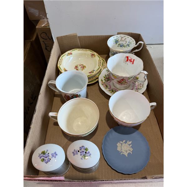 Tea cups and saucers, salt and pepper, shakers, etc.