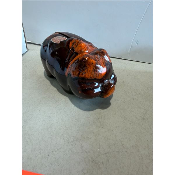 Pottery piggy bank and contents