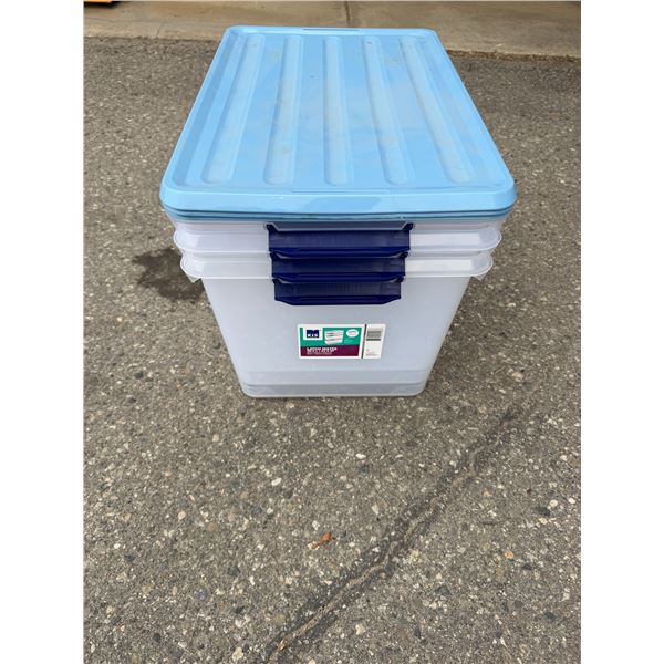 Three storage bins with lids