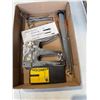 Image 1 : Files, stapler, and other items