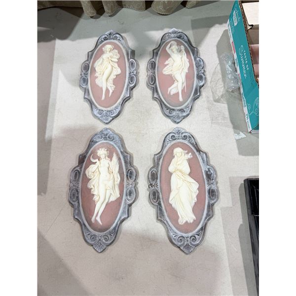 vintage Incolay stone wall plaque featuring a cameo design of a woman, likely from a Four Seasons se