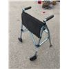 Image 1 : Standing folded up walker