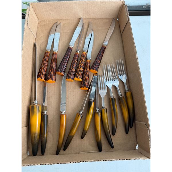 vintage Crown Crest steak knives and cutlery featuring faux stag horn handles made from Bakelite or 