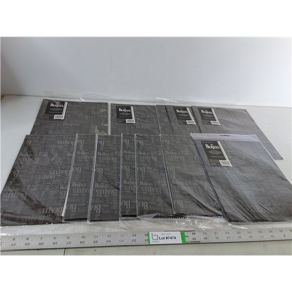 (13) Packs of The Beatles Gift Wrap - As Is