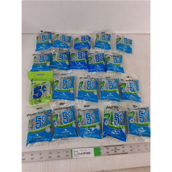 Many Packs of Plastic 5 Cent Coin Wraps