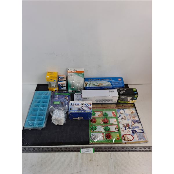 Assorted Sealed/Unused Stock - Bulbs, Travel Steamer, Helping Hand, Poncho, Gift Wrap, Misc.